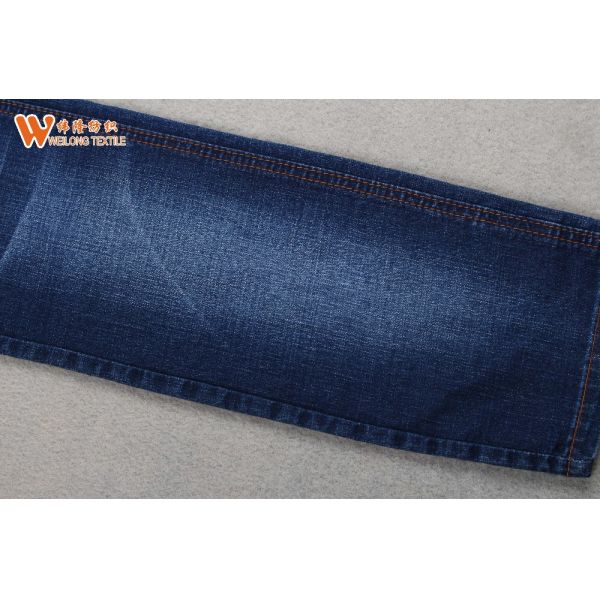 China Stocklot Cotton Poly Stretch Denim Fabric for Jeans Garments