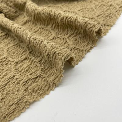 Tissu de tricot de jaquard 1000 kg MOQ Shanghai/Ningbo Port Crêpe au nid de miel 97% Polyester 3% spandex 175cm 26gsm N07-079