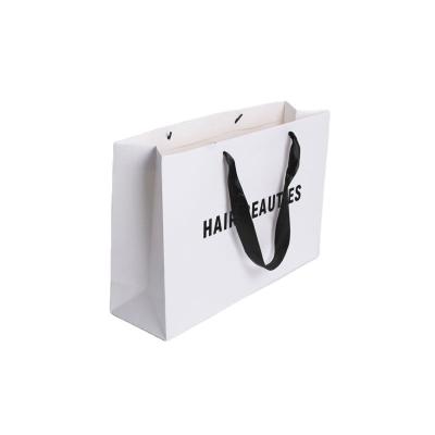 Bolsas de papel de cartão de marfim com logotipo personalizado para embalagens de roupas artesanais