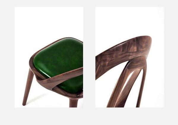 Chaise de salle à manger de noyer de style nordique lumière de luxe en cuir authentique noir massif