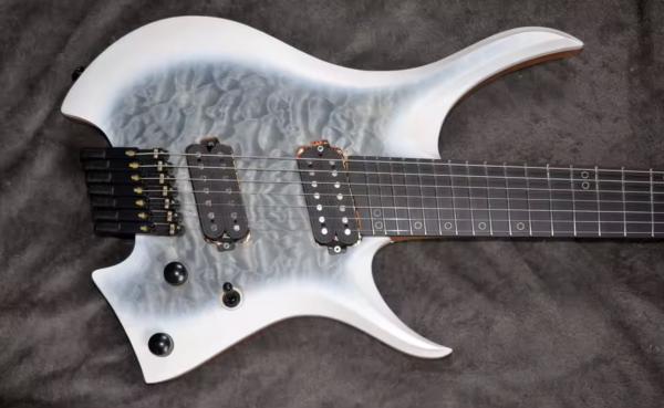 2025 Fanned Frets 7 Strings Headless Electric Guitar White Color with Eye Poplar 5-ply Roasted Maple