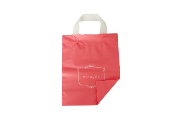 La poignée en plastique faite sur commande lisse de LDPE met en sac recyclable et réutilisable