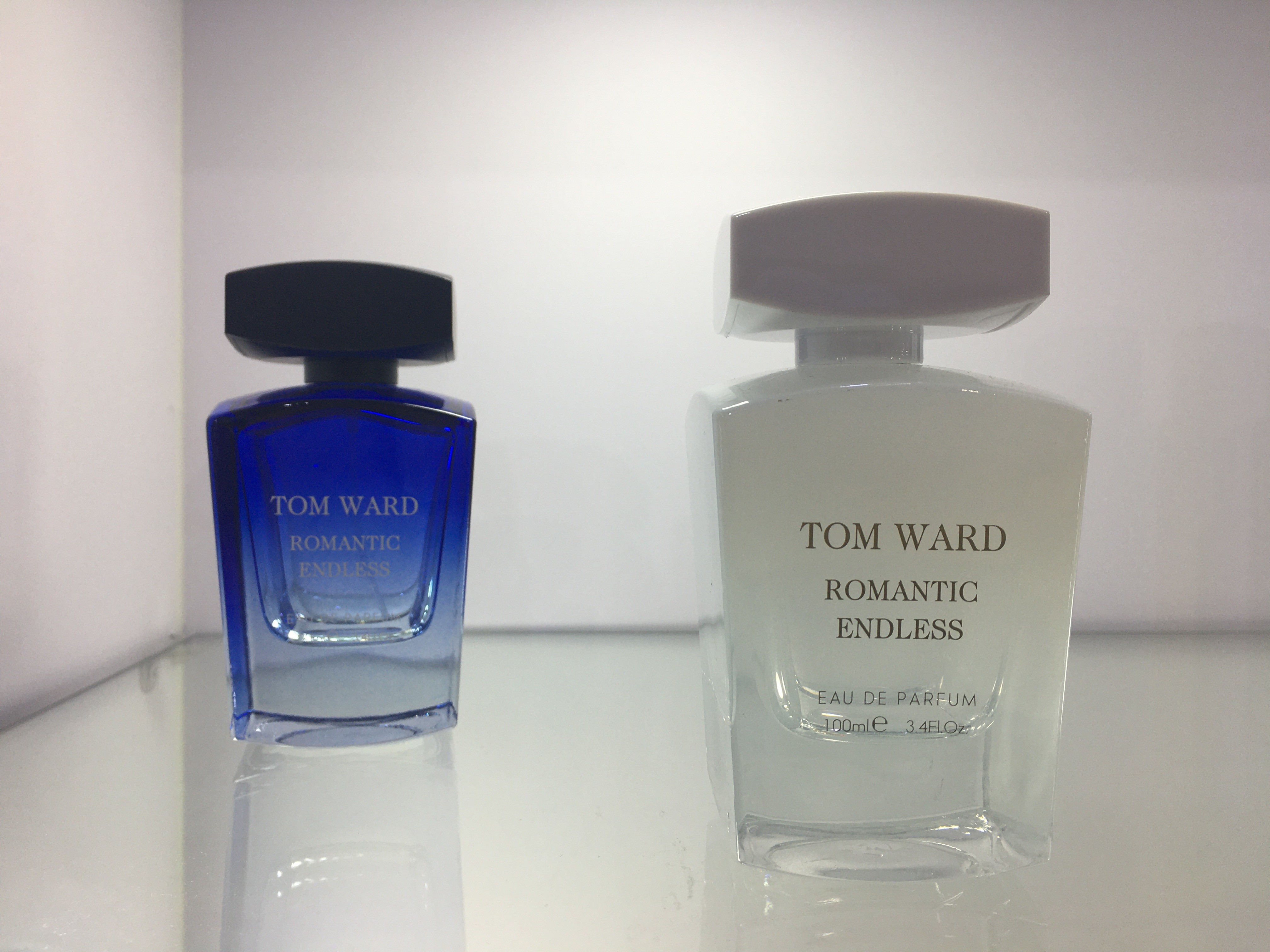 Изготовленный на заказ контейнер духов 50ml 100ml стеклянный с крышкой атомизатора квадратной