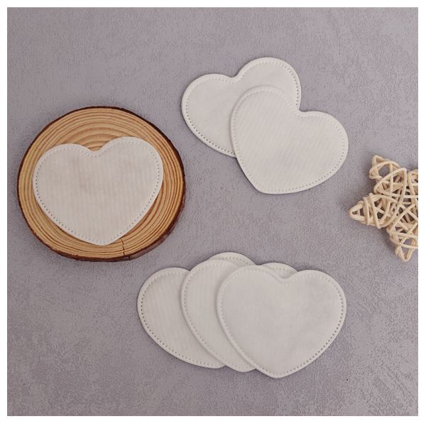 Discos de algodón desechables biodegradables en forma de corazón ecológicos OEM para desmaquillar