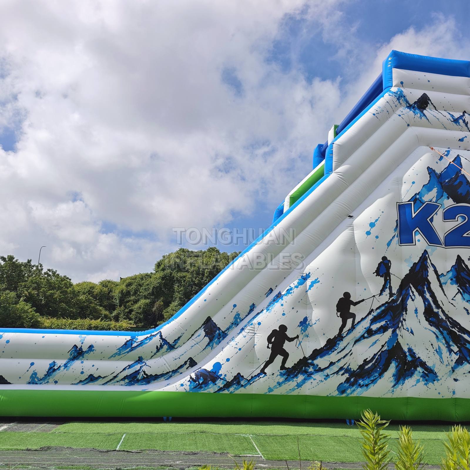 Commercial K2 Double Lane Inflatable Slide with Mountain Graphics High Side Walls and Safety Landing Areas for Parks Events and Rentals