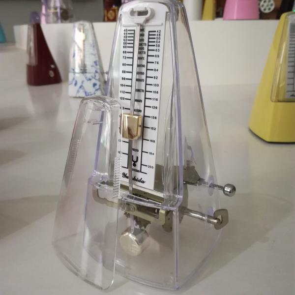 china  Factory price musical instrument accessories yinda mechanical metronome tuner for guitar/piano/voilin beginners