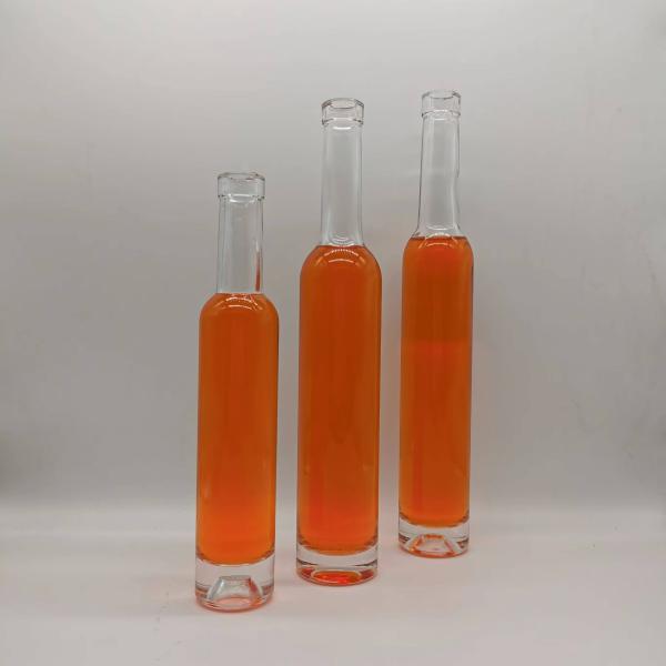 Деликатный внешний вид Высокая стеклянная бутылка для виски Ликер Супер Клинт стеклянный материал