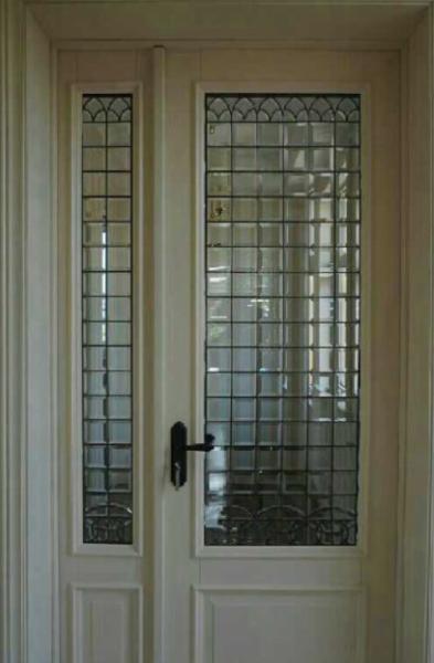 clear beveled decorative glass panel of patina caming