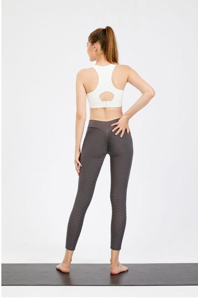 A ioga veste o Spandex 50% que de 50% as senhoras misturadas de nylon malham calças e partes superiores aptas
