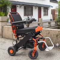 Le fauteuil roulant électrique se pliant léger 100KG d'OIN chargent la puissance 2 de 150W X