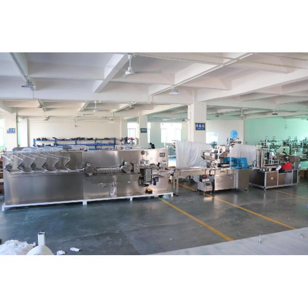 Compact baby wipes making packing line featuring continuous feeding and high speed operation for large scale manufacturing