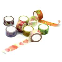 o custume faz a fita de papel do washi testes padrões dos frutos frescos com a fita de mascaramento do logotipo