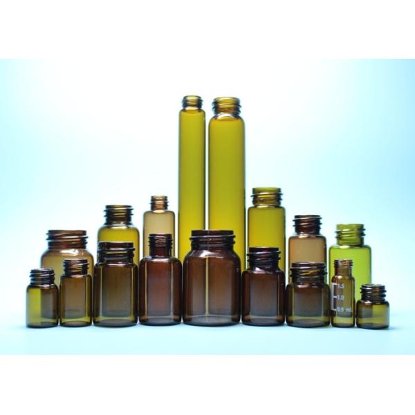 Ясность и янтарная фармацевтическая или косметикой продетая нитку верхняя пробирка стеклянной бутылки