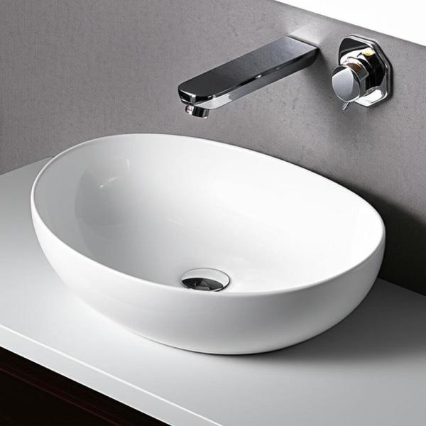 Design moderne bassin artistique bassin de lavage à main en céramique sur le comptoir bassin de lavage à main en céramique dans les articles sanitaires bassin et évier de salle de bain