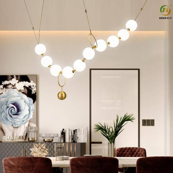 Nordic postmodern light luxury living room glass ball necklace line chandelier