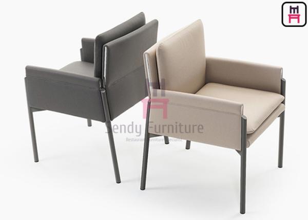 Tanned Leather Upholstered Arm Chair Black Titanium Steel For Restaurant Bar Cafe