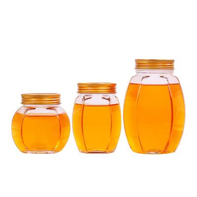 A barriga grande Honey Glass Jar 500ml seis tomou partido ISO9001 resistente ao calor