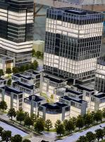 Architectural Model of Modern Urban Complex with Integrated Stadium, Business District and Landscaping