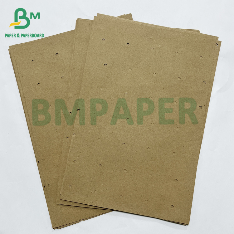 70gsm Recyclable Round Hole Perforating Underlay Kraft Paper For Garment Factory 70 гсм перерабатываемая круглая отверстие перфорирующая подкладка kraft бумаги для швейной фабрики