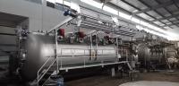 Machine de blanchiment et de teinture textile à haute efficacité et à faible consommation