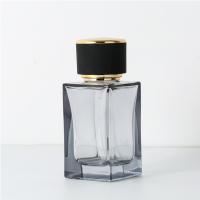 O quadrado luxuoso 50ml perfuma garrafas de vidro cosméticas com tampão do pulverizador