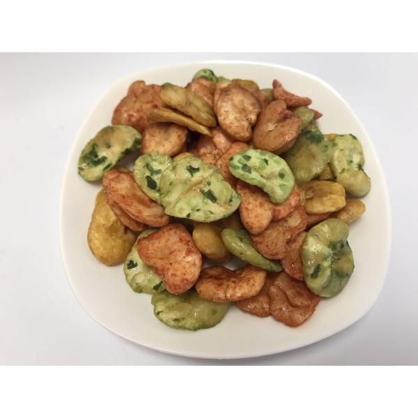 Хрустящий вкус меда и масла покрыл зажаренную широкую фасоль откалывает закуски