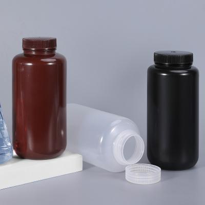 Garrafa cilíndrica transparente de plástico de 1000 ml de PP/ HDPE com tampa à prova de vazamento e reutilizável