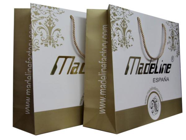 Gold White Paper Carrier Bag Of Made Line Lady Fashion Collection Twist Handle Embossed Logo