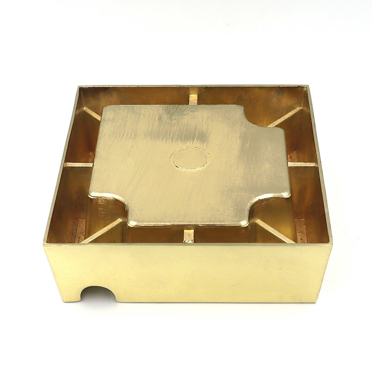 Square polished gold metal ashtray with multi-groove design and independent storage compartment for luxury decor