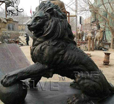 Large Black Bronze Lion Statue Metal Animal Garden Decoration With Ball