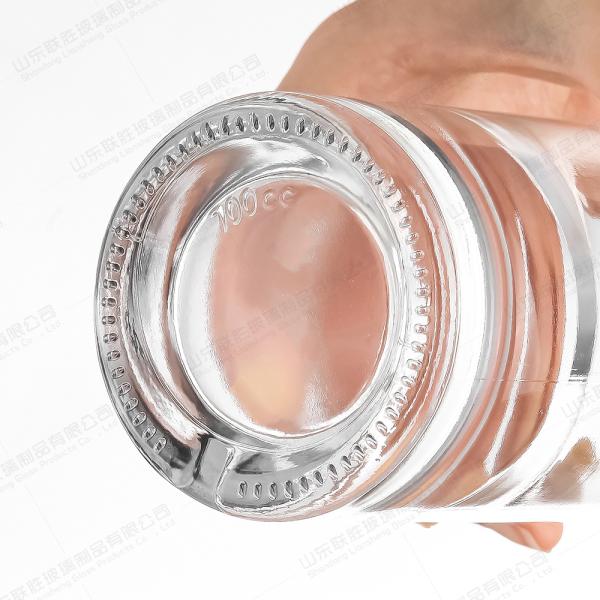 250 ml OEM / ODM aceptable botella de vidrio de lujo Vodka Tequila con tapa de oro de aluminio único