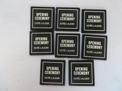 Custom Estee Lauder 3d Soft PVC Lapel Garment Label Black Color For Open Ceremony , Durable And Waterproof