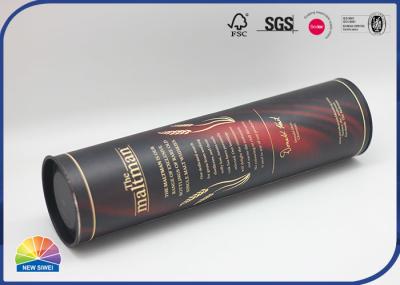 As vendas da garrafa de vinho indicam o tubo de papel composto de empacotamento com extremidade do metal