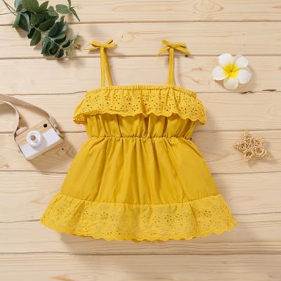 As meninas da roupa do vestido das crianças da cor de Soild do verão lançam a venda por atacado da roupa das crianças amarelas do vestido