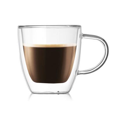 O copo de vidro da parede dobro resistente ao calor feito a mão sofisticado procura o café