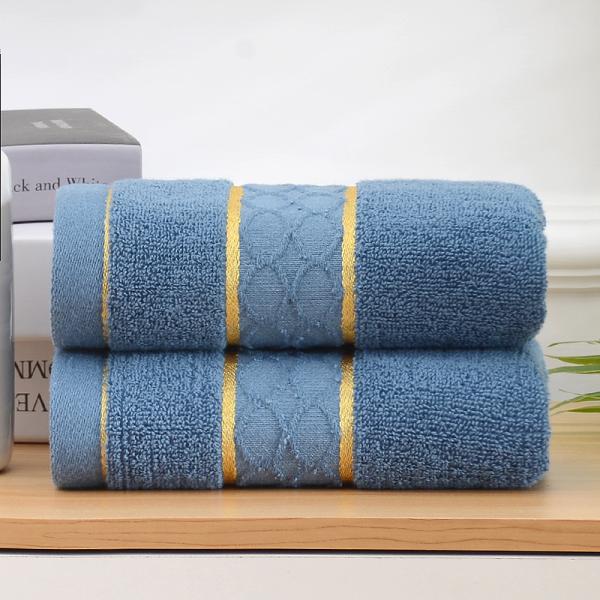 Logo de la société de broderie du ménage Une serviette en coton pur pour le lavage du visage et le bain