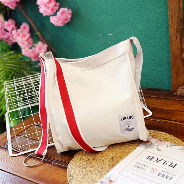 New canvas small ring shoulder Messenger bag simple portable leisure Joker bag women
