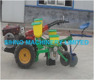 Single grain corn precision planter working with walking tractor