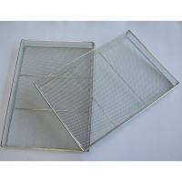 Plateau de cuisson perforé en treillis métalliques empilés pour cuire du pain au four