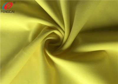 A cor amarela Lycra Semi-maçante fez malha a tela do Spandex do poliéster para o fato