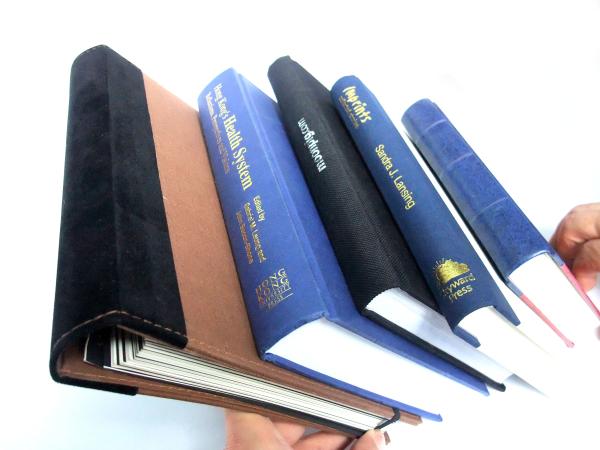 Perfectionnez les imprimantes rondes attachées de livre relié d'épine pour la promotion et annoncez