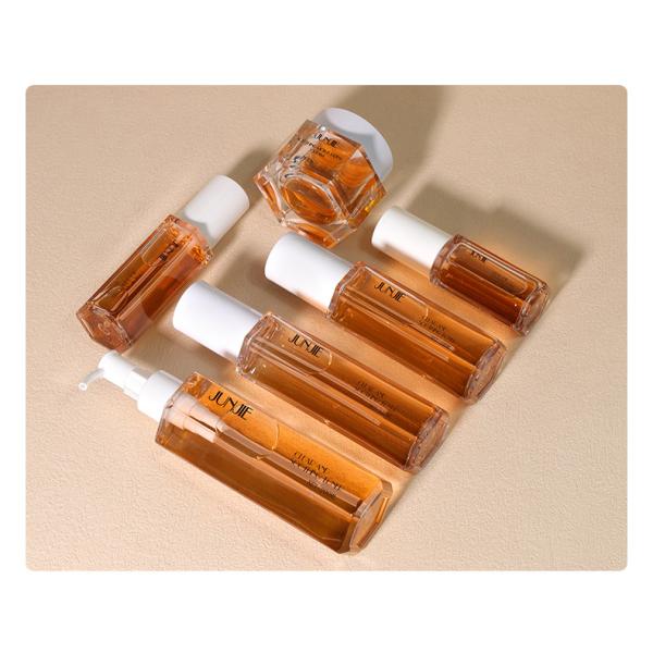 Envases cosméticos de lujo de 100 ml 120 ml 200 ml Botella de loción hexagonal de plástico con bomba de pulverización de niebla corporal para envases para el cuidado de la piel