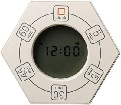 Um desktop com timer digital elegante e inovador Timer de produtividade giratório hexagonal com relógio