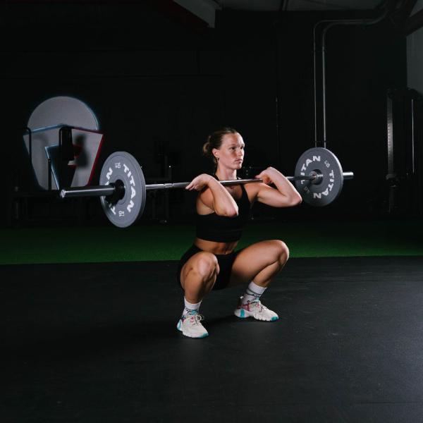 Plaques de haltères en caoutchouc de 51 mm Plaques de poids de matériel de fitness de 15 kg Noir