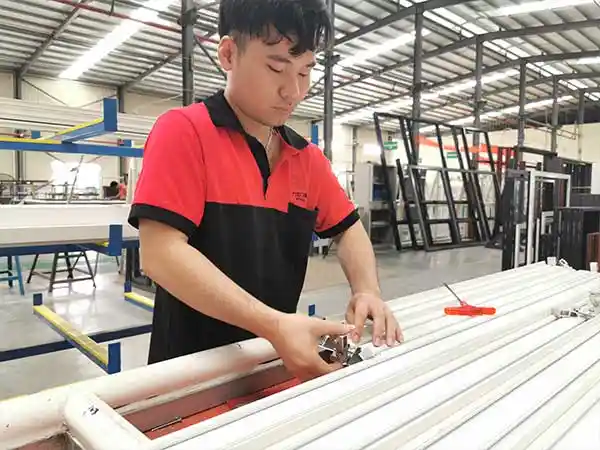 WANJIA-door-and-window-install-corner-brace Exterior Aluminium Folding Doors Double Glass Soundproof Bifold Doors For Shop