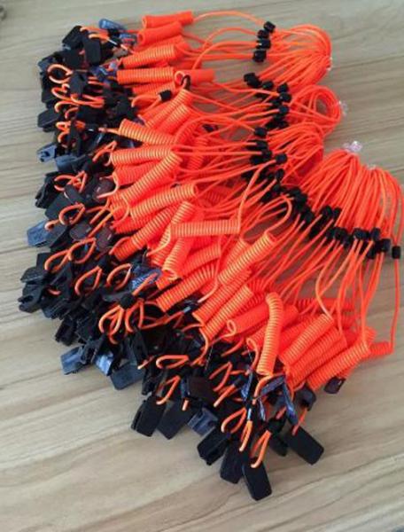 Plastic orange short spiral spring coil lanyard leash with black plastic clip safety coils
