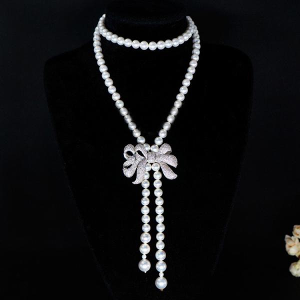 Women White 8mm Shell Pearl Starnds Tassel Necklace with Cubic Zirconia Bow Charm (SN702141)