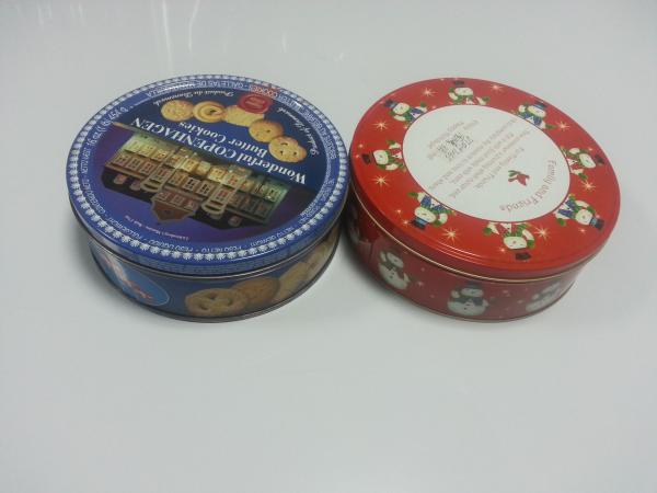 Recipiente do biscoito da lata do cilindro para o feriado do Natal com etiqueta na parte inferior