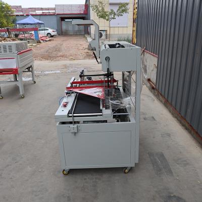 PLC Control Fully Automatic Shrink Wrapping Machine System ISO9001 Certified 220V 50Hz