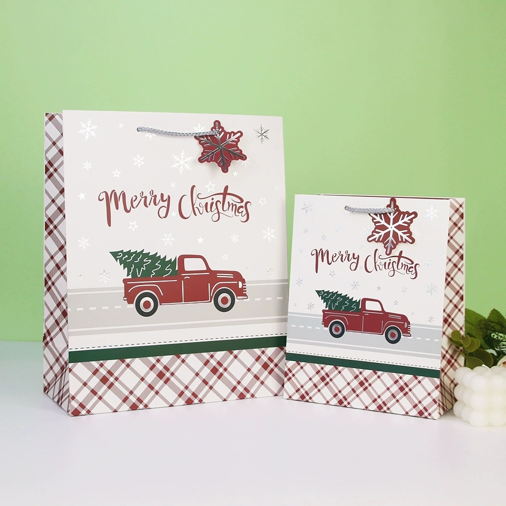 Holiday Paper Gift Bags with Handles and Foil Stamped Merry Christmas Print